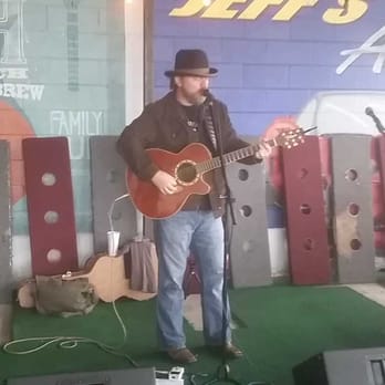 Stiles Switch BBQ & Brew - Local musician Dan Adams playing on the patio at Stiles Switch bbq #sxsw2015 #Austinmusic - Barbeque Near Me - Austin, Texas