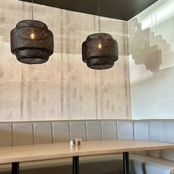 L’Olivia Pizzeria & Ristorante - Each booth has lights above.