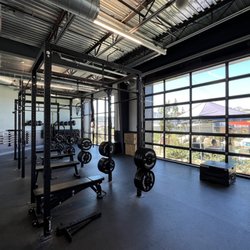 Mesa Rim Climbing Center - North City - Some free weights and fitness equipment in a dedicated area