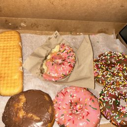 Chocolate cover donut and chocolate cover sprinkles Chocolate cover donut and chocolate cover sprinkles
