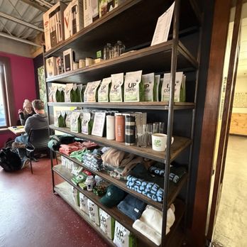 Up Cafe & Up Coffee Roasters - Merch wall! - Coffee & Tea Near Me - Minneapolis, Minnesota