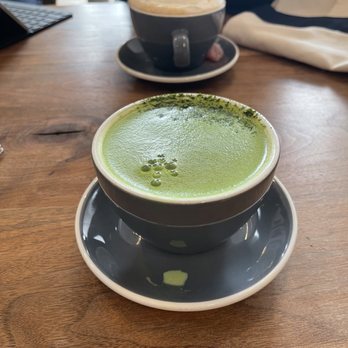 Pangolin Café - Matcha Latte and one of the seasonal drinks in the background - Coffee & Tea Near Me - Reno, Nevada Pangolin Café - Matcha Latte and one of the seasonal drinks in the background - Coffee & Tea Near Me - Reno, Nevada
