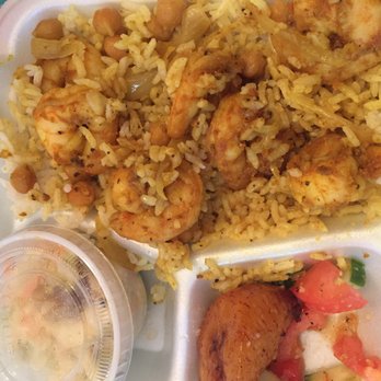 Charles' Kitchen - Curry Shrimp Small with mango slaw and Omg Tomato Salad - Caribbean Near Me - Henrico, Virginia Charles' Kitchen - Curry Shrimp Small with mango slaw and Omg Tomato Salad - Caribbean Near Me - Henrico, Virginia
