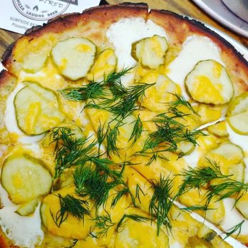 Pizza Hyena - Dill Pickle Pizza with cauliflower Crust, yum! Add ranch drizzle for even more flavor. - Pizza Near Me - Surfside Beach, South Carolina Pizza Hyena - Dill Pickle Pizza with cauliflower Crust, yum! Add ranch drizzle for even more flavor. - Pizza Near Me - Surfside Beach, South Carolina