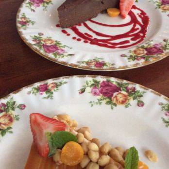 EDNA Restaurant - Caramel and Peanut Semifreddo in foreground Flourless Chocolate Cake in back - Canadian (New) Near Me - Halifax, Nova Scotia EDNA Restaurant - Caramel and Peanut Semifreddo in foreground Flourless Chocolate Cake in back - Canadian (New) Near Me - Halifax, Nova Scotia