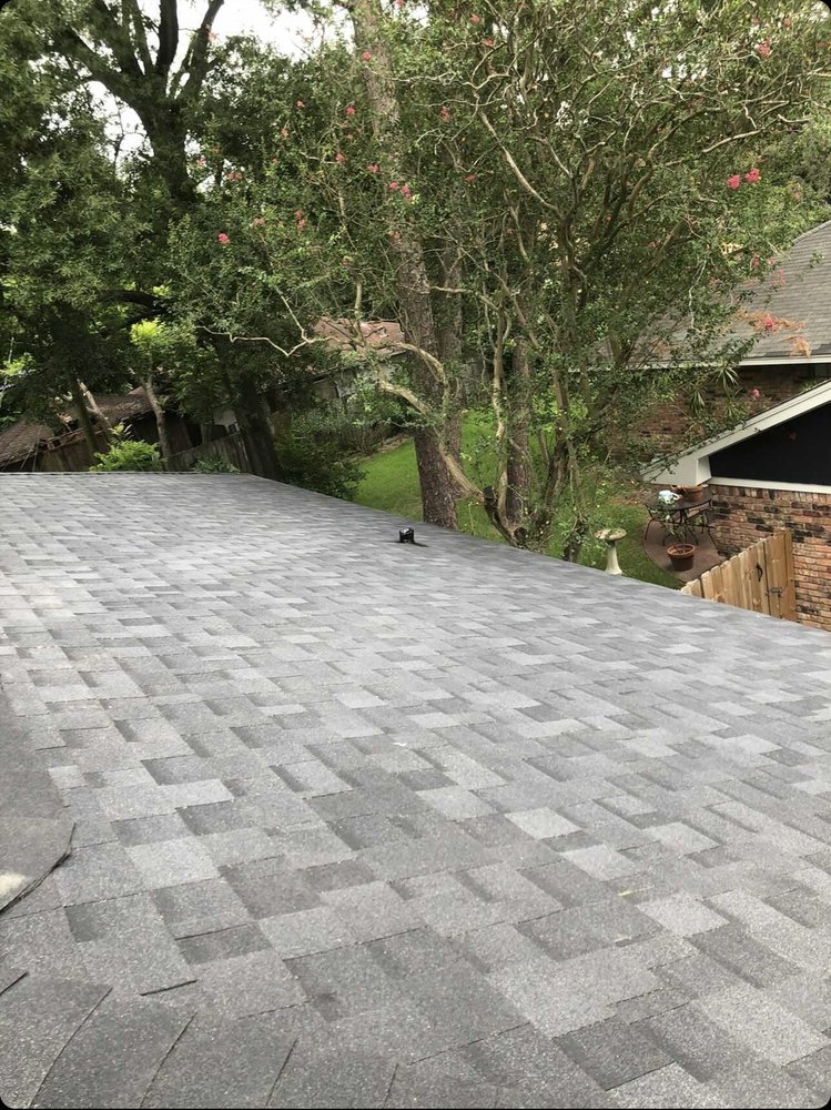 Slide of Reality Roofing