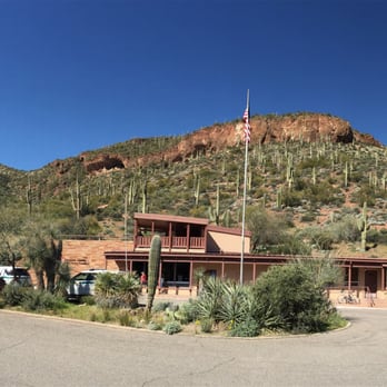 Tonto National Monument - Vistor center with lower cliff dwelling in the background - Landmarks & Historical Buildings Near Me - Roosevelt, Arizona Tonto National Monument - Vistor center with lower cliff dwelling in the background - Landmarks & Historical Buildings Near Me - Roosevelt, Arizona
