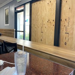 Pho Saigon Bay - Place supposedly got broken into. Maybe they had a hungry customer that was more irritated then I and decided to break the glass, lol.