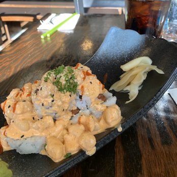 QQ Sushi & Kitchen - You can barely even see the roll. Messy - Sushi Bars Near Me - Spokane, Washington QQ Sushi & Kitchen - You can barely even see the roll. Messy - Sushi Bars Near Me - Spokane, Washington