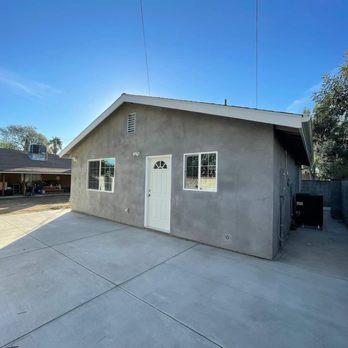 Ultimate Green Construction - a garage with a white door - General Contractors Near Me - Pacoima, California Ultimate Green Construction - a garage with a white door - General Contractors Near Me - Pacoima, California
