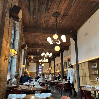 Le Crocodile - Wood ceilings and exposed brick? We must be in Williamsburg - French Near Me - Brooklyn, New York