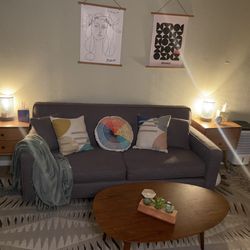 Moore Vulnerability Counseling - Couch complete with feelings wheel pillow. I use this pillow to help couples identify feelings and be able to have healthy conversation!