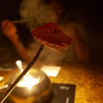 The Melting Pot - Strawberry dripping white chocolate - Fondue Near Me - Boca Raton, Florida The Melting Pot - Strawberry dripping white chocolate - Fondue Near Me - Boca Raton, Florida
