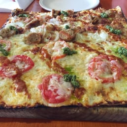 1/2 margherita, 1/2 Toscana. Absolutely delicious 1/2 margherita, 1/2 Toscana. Absolutely delicious