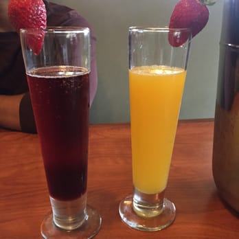 Broken Yolk Cafe - Mimosas (pomegranate and orange) - Breakfast & Brunch Near Me - Oceanside, California Broken Yolk Cafe - Mimosas (pomegranate and orange) - Breakfast & Brunch Near Me - Oceanside, California