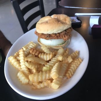 Scorz Bar and Grill - Fried tenderloin with regular fries. - Sports Bars Near Me - Mount Vernon, Iowa Scorz Bar and Grill - Fried tenderloin with regular fries. - Sports Bars Near Me - Mount Vernon, Iowa