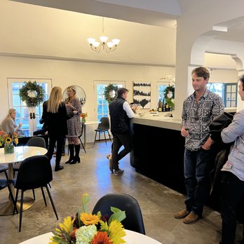 Backstage Winery - a group of people in a tasting room - Wine Tasting Room Near Me - Napa, California