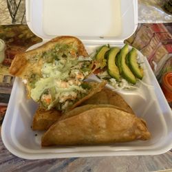 Brisas Del Pacifico - This what 3 Shrimp tacos look like to go  The taste is ok also the prive totally recomend coming here