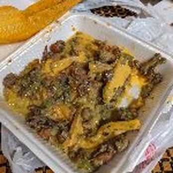 Sergio's Tacos - Watery Asada fries. Why yellow cheese? Never heard of using nacho cheese for it. - Mexican Near Me - Montebello, California Sergio's Tacos - Watery Asada fries. Why yellow cheese? Never heard of using nacho cheese for it. - Mexican Near Me - Montebello, California