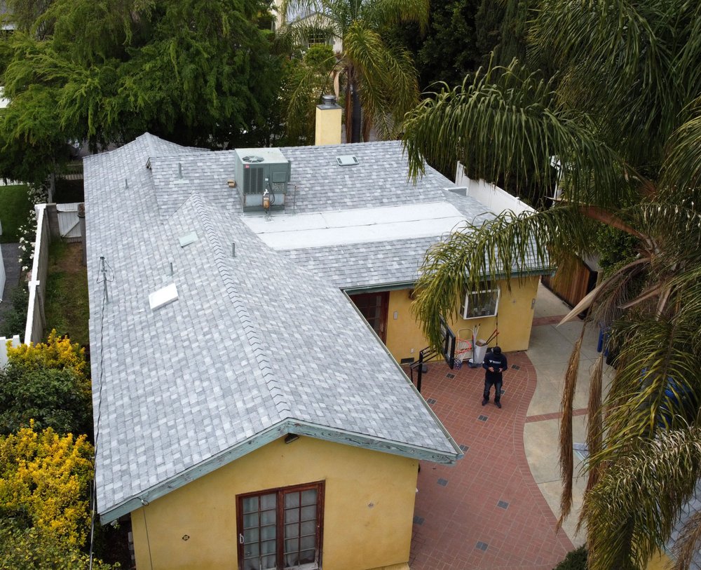 Slide of Mega Roofing