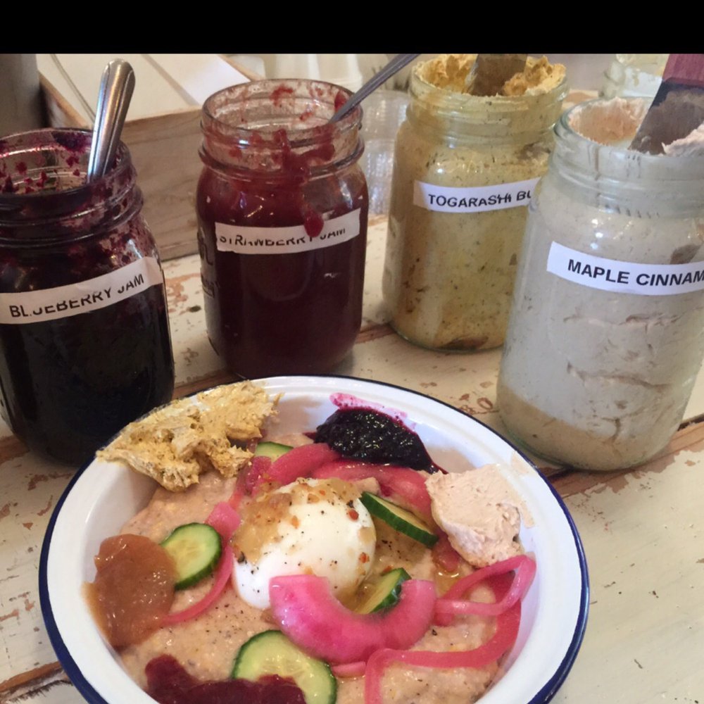 Bagel Miller - Summer Grits (w/ sambal, sweet/sour onions, soft-b egg, scallions, Persoan cucs) decorated by yours truly w/truly delectable butters & jams. - Comfort Food Near Me - Chicago, Illinois Bagel Miller - Summer Grits (w/ sambal, sweet/sour onions, soft-b egg, scallions, Persoan cucs) decorated by yours truly w/truly delectable butters & jams. - Comfort Food Near Me - Chicago, Illinois