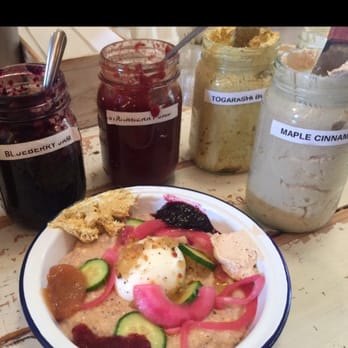 Bagel Miller - Summer Grits (w/ sambal, sweet/sour onions, soft-b egg, scallions, Persoan cucs) decorated by yours truly w/truly delectable butters & jams. - Comfort Food Near Me - Chicago, Illinois Bagel Miller - Summer Grits (w/ sambal, sweet/sour onions, soft-b egg, scallions, Persoan cucs) decorated by yours truly w/truly delectable butters & jams. - Comfort Food Near Me - Chicago, Illinois