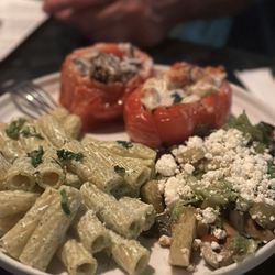 Roma - Stuffed tomatoes au gratin, one with chicken one with filet mignon