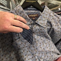 Johnston & Murphy - Most J&M shirts have a different fabric on the inside of the cuff for a nicer casual look when the sleeves are rolled up.