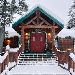 Exterior outside entrance of Dog Creek Lodge - Magical looking entrance to the Event Lodge - Olney, Montana Exterior outside entrance of Dog Creek Lodge - Magical looking entrance to the Event Lodge - Olney, Montana