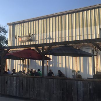 M. Special Brewing Company - One side of the outdoor patio. - Breweries Near Me - Goleta, California