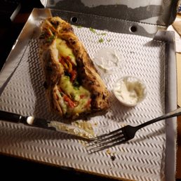 Slight hiccup with the delivery, but not Purezza's fault... actually they're at fault for this AMAZING calzone!! Thank you Slight hiccup with the delivery, but not Purezza's fault... actually they're at fault for this AMAZING calzone!! Thank you