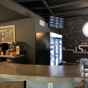Frothy Moon Brewhouse - Beer taps and cooler. - Brewpubs Near Me - Williamsburg, Virginia
