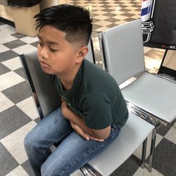 San Luis Obispo Beauty College - Kyle's doesn't look happy but likes his haircut