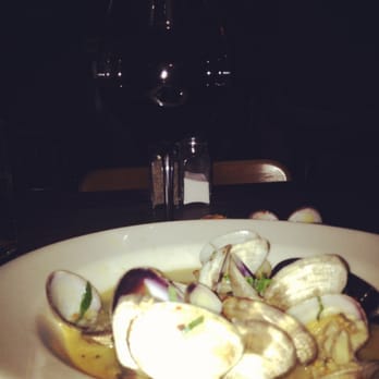 Gino's - Glass of red and clams from the late night menu. - Italian Near Me - Portland, Oregon Gino's - Glass of red and clams from the late night menu. - Italian Near Me - Portland, Oregon