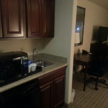Holiday Inn Yuma - Little kitchen area with frig, sink, microwave, coffee maker and lots of cabinets - Hotels Near Me - Yuma, Arizona