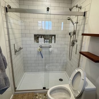 CP Remodeling - AFTER-Larger shower with wall tile, safety bars, and pan. Recessed lighting and paint. Much brighter. - Plumbing Near Me CP Remodeling - AFTER-Larger shower with wall tile, safety bars, and pan. Recessed lighting and paint. Much brighter. - Plumbing Near Me