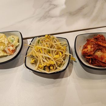Seoul Bites - three bowls of food on a table - Korean Near Me - Lombard, Illinois Seoul Bites - three bowls of food on a table - Korean Near Me - Lombard, Illinois