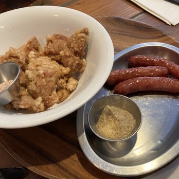 Junpuu - Karaage chicken w/Himalayan salt,Japanese sausage w/deli mustard. Oops! I stole one! - Ramen Near Me - Honolulu, Hawaii Junpuu - Karaage chicken w/Himalayan salt,Japanese sausage w/deli mustard. Oops! I stole one! - Ramen Near Me - Honolulu, Hawaii