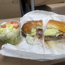 Roast beef, sandwich, and salad Roast beef, sandwich, and salad