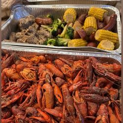 New Orleans Seafood - Cooked crawfish ($8.99/lb), turkey necks, broccoli, sausage, potatoes and corn