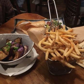 Trader Vic's - Fries, chinese eggplants, and poke with taro chips - Hawaiian Near Me - Emeryville, California Trader Vic's - Fries, chinese eggplants, and poke with taro chips - Hawaiian Near Me - Emeryville, California