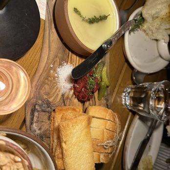 Wolf in the Woods - The yellow bowl is a chicken liver pate with a side of bread - Wine Bars Near Me - San Diego, California