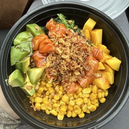 Make Your Own Poke White rice, Salmon, mango, corn, avocado, seaweed salad, crispy onion, eel sauce.