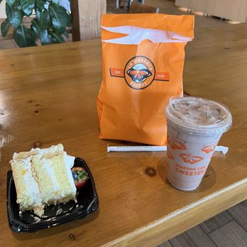 La Monarca Bakery & Cafe - Fruit cake slice and Mexican chocolate. - Coffee & Tea Near Me - Los Angeles, California La Monarca Bakery & Cafe - Fruit cake slice and Mexican chocolate. - Coffee & Tea Near Me - Los Angeles, California