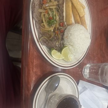 Caribe Cafe Restaurant - Bistec De Palomilla, white rice, black beans, and yuca fries - Cuban Near Me - Miami, Florida