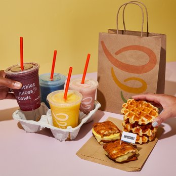 Jamba - a person grabbing a sandwich from a paper bag - Juice Bars & Smoothies Near Me - Franklin, Tennessee Jamba - a person grabbing a sandwich from a paper bag - Juice Bars & Smoothies Near Me - Franklin, Tennessee