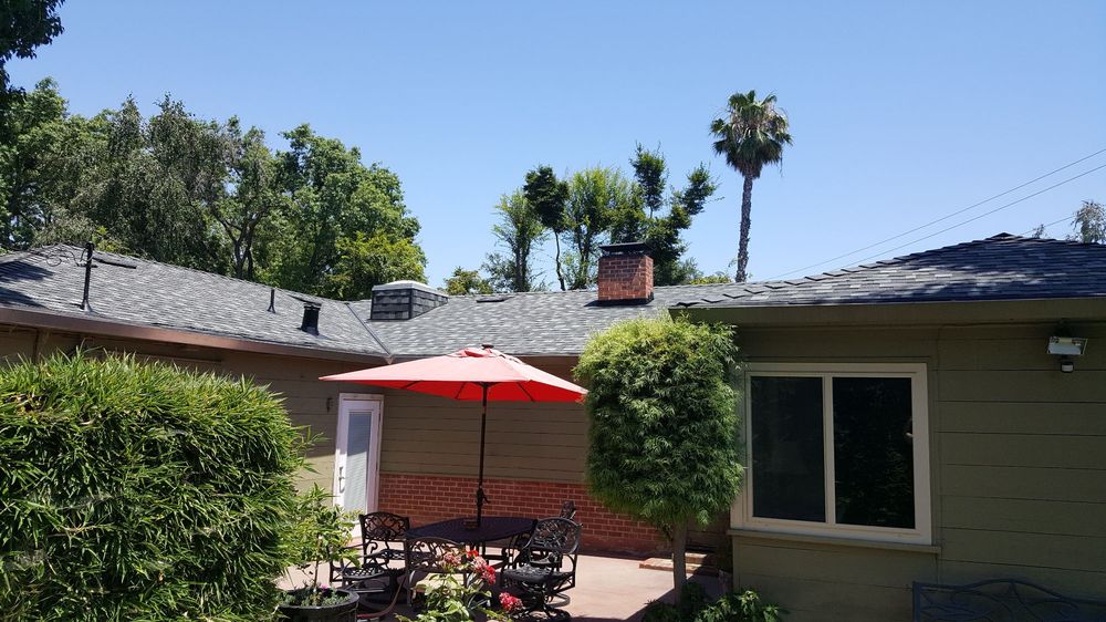 Slide of Green's Roofing