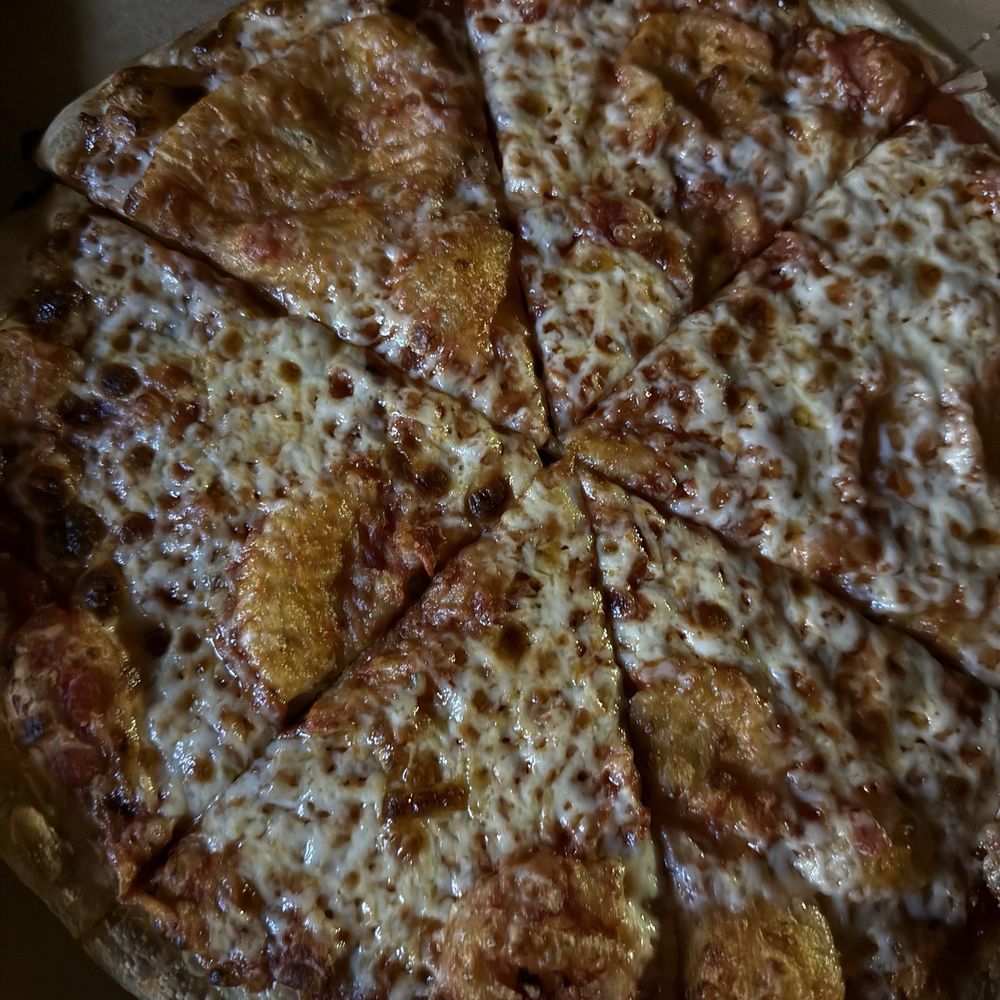 The "extra cheese" that supposedly disintegrates when it goes into the oven