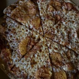 The "extra cheese" that supposedly disintegrates when it goes into the oven
