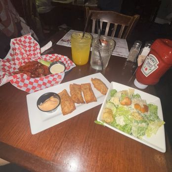 The Village Pub - Honey Traditional Wings (10 ct) Cheesesteak Wontons Side Caesar Salad - Sports Bars Near Me - Sewell, New Jersey The Village Pub - Honey Traditional Wings (10 ct) Cheesesteak Wontons Side Caesar Salad - Sports Bars Near Me - Sewell, New Jersey
